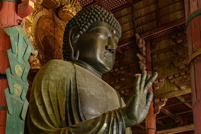 The largest Buddha (Daibutsu-Den) at The Todaiji Temple or Daibutsu of Nara Japan With a height of 15 meters and is one of the sacred and respected Buddha images of the Japanese people