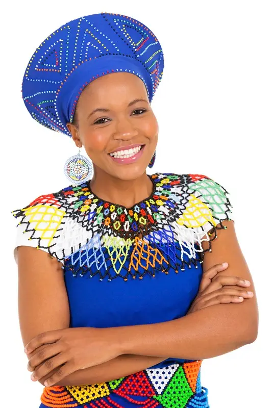 pretty south african woman with arms crossed on white background