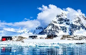 Polar Research Station Beneath Snowy Peaks